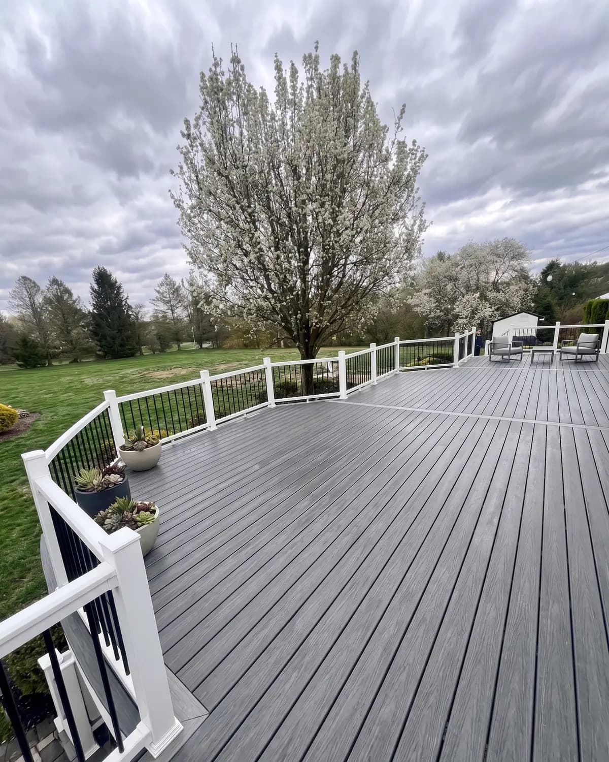 Beautiful paver patio with fire pit built by Premier Home Construction in NJ